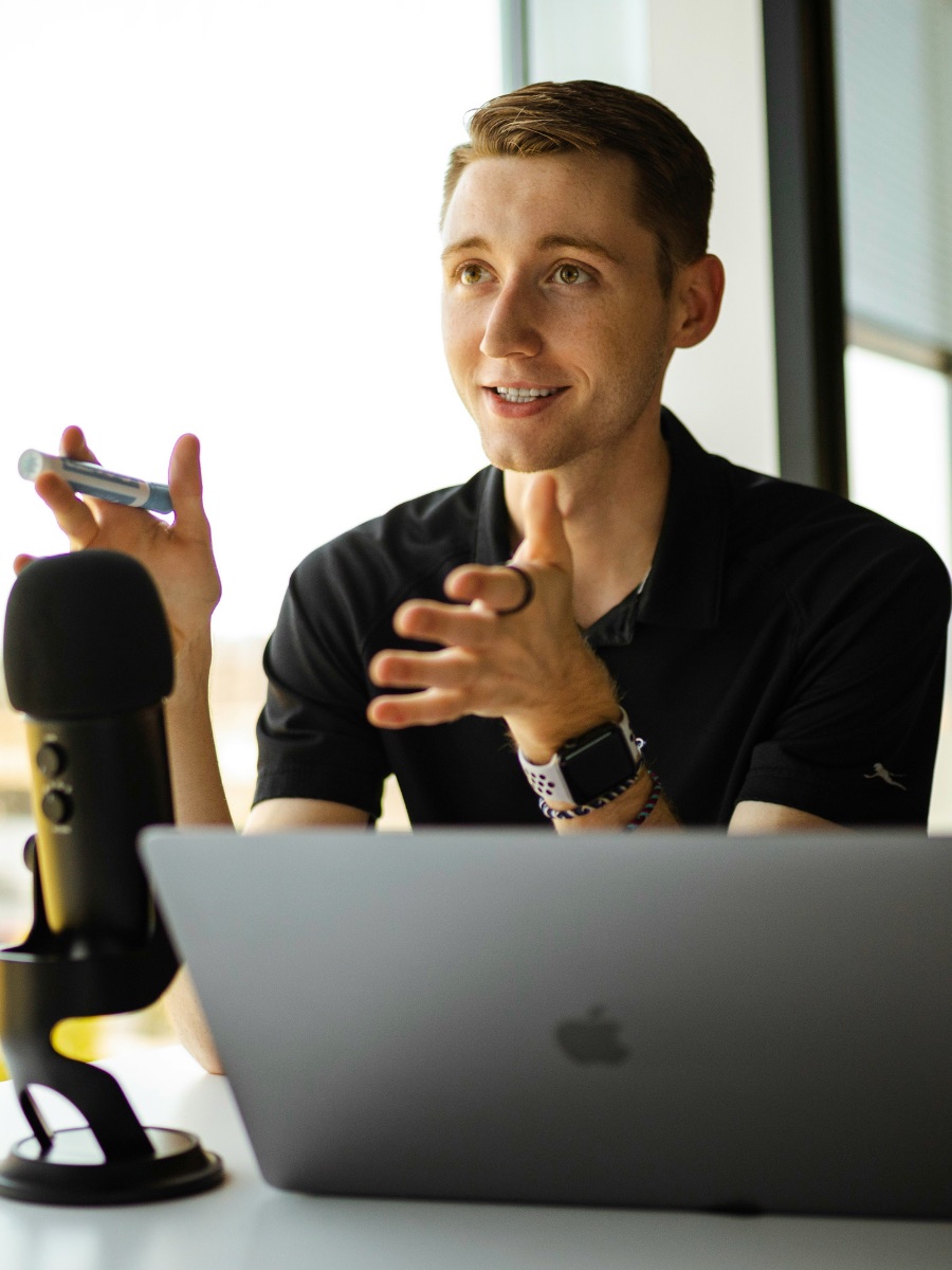 Our presenter recording at the microphone