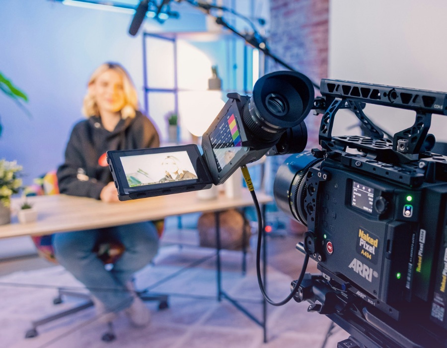 Cinema camera filming our actor in the studio