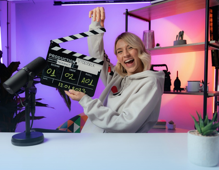 Our creator with a clapperboard in the studio